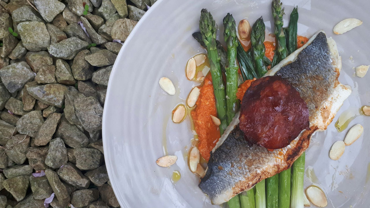 Sea Bass with Romesco Sauce with roasted fennel and asparagus