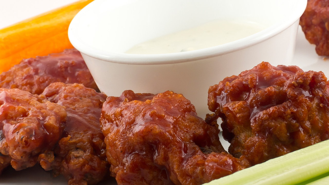 Korean fried crispy chicken tossed in a sesame hot and sour sauce