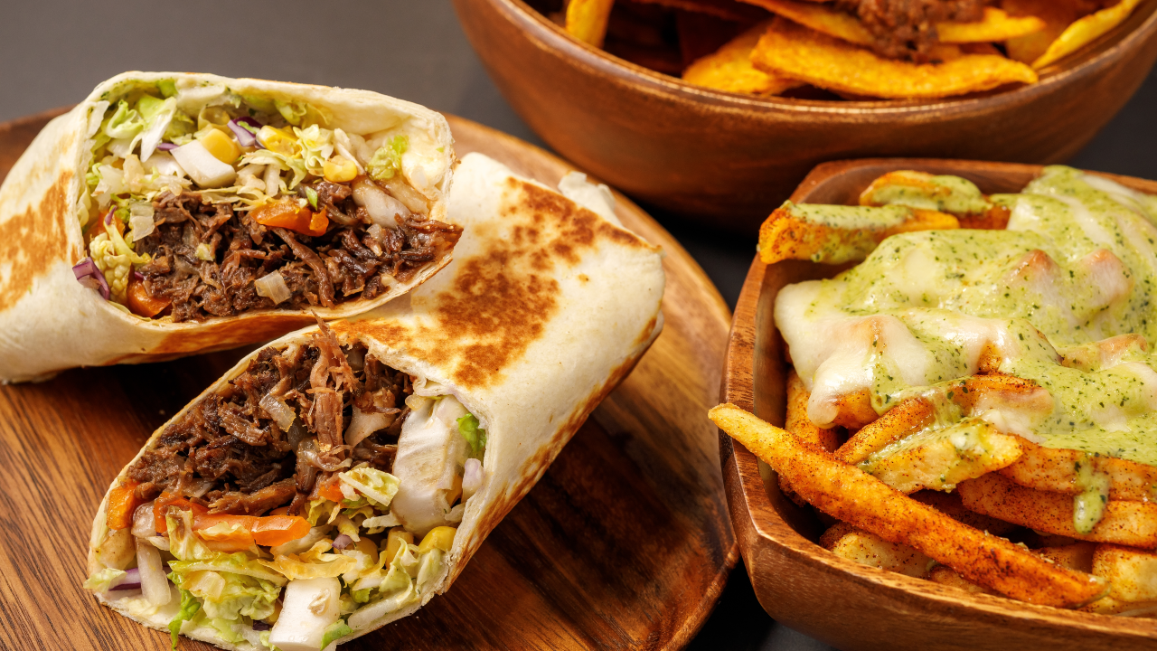 Air Fryer Chicken Fajitas with homemade nachos, salsa and guacamole