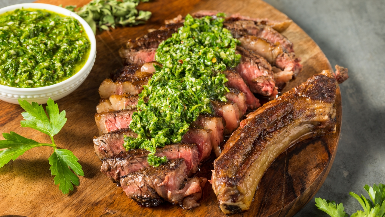 Barbecued Ribeye Steak on the Bone with Chimichurri and Salads