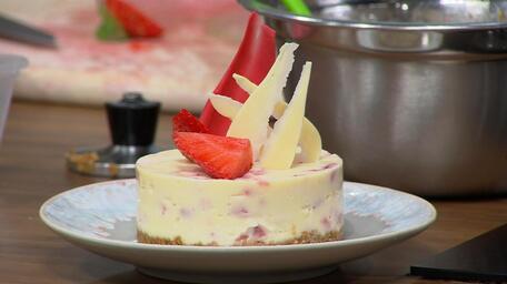 Mini white chocolate and strawberry cheesecakes