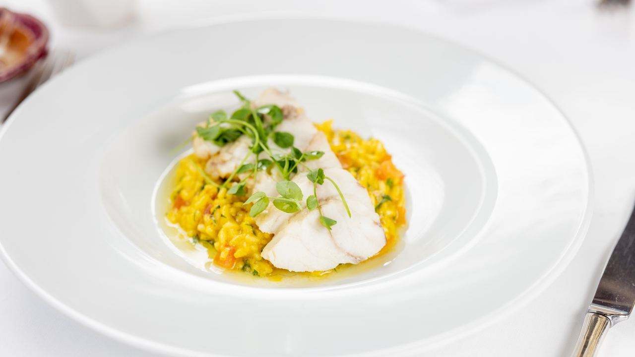 Pan-Fried Sea Bass with Creamy Leek and Smoked Pancetta Risotto