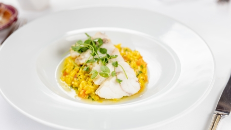 Pan-Fried Sea Bass with Creamy Leek and Smoked Pancetta Risotto