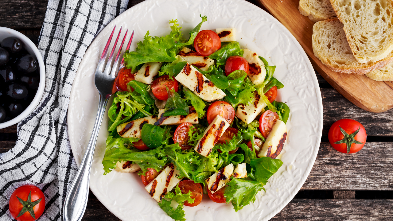 Grilled sourdough with whipped ricotta, tomato & onion relish and rocket salad