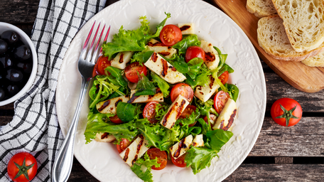 Grilled sourdough with whipped ricotta, tomato & onion relish and rocket salad