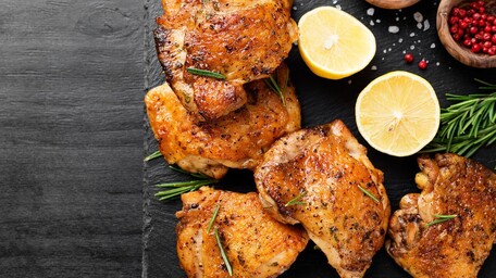 Spicy Chicken Thighs, Cajun Wedges, Yogurt Slaw