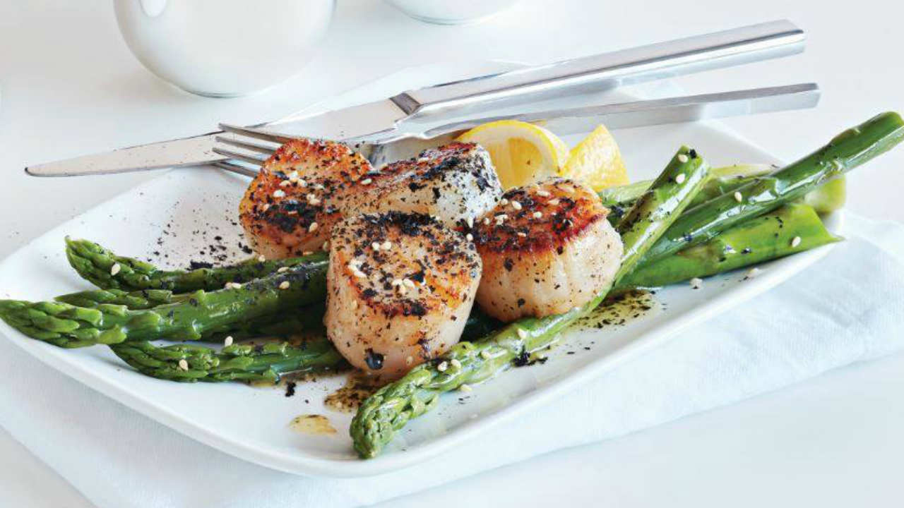 Roasted king scallops, new season asparagus and Dillisk butter