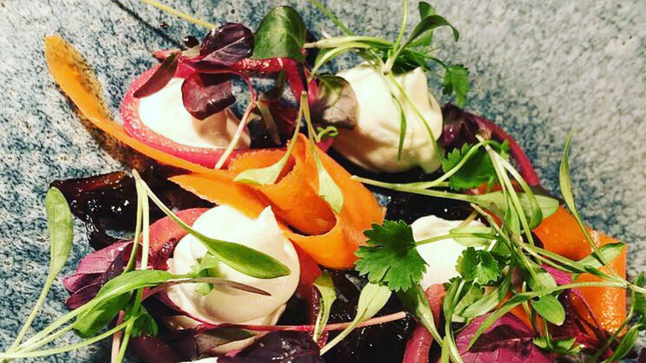 Goat&#39;s cheese mousse with red onion jam, pickled carrot chutney, mulled wine poached pears and walnut crumb