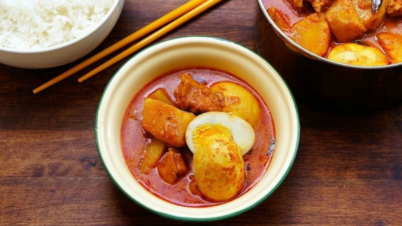 Chicken Curry Malay Style with Potatoes, Hen Egg and Coconut Milk, with jasmine rice 