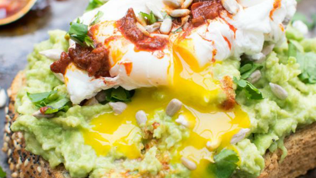 Poached Eggs on Toast with Avocado Crush, Smoked Salmon and Sriracha