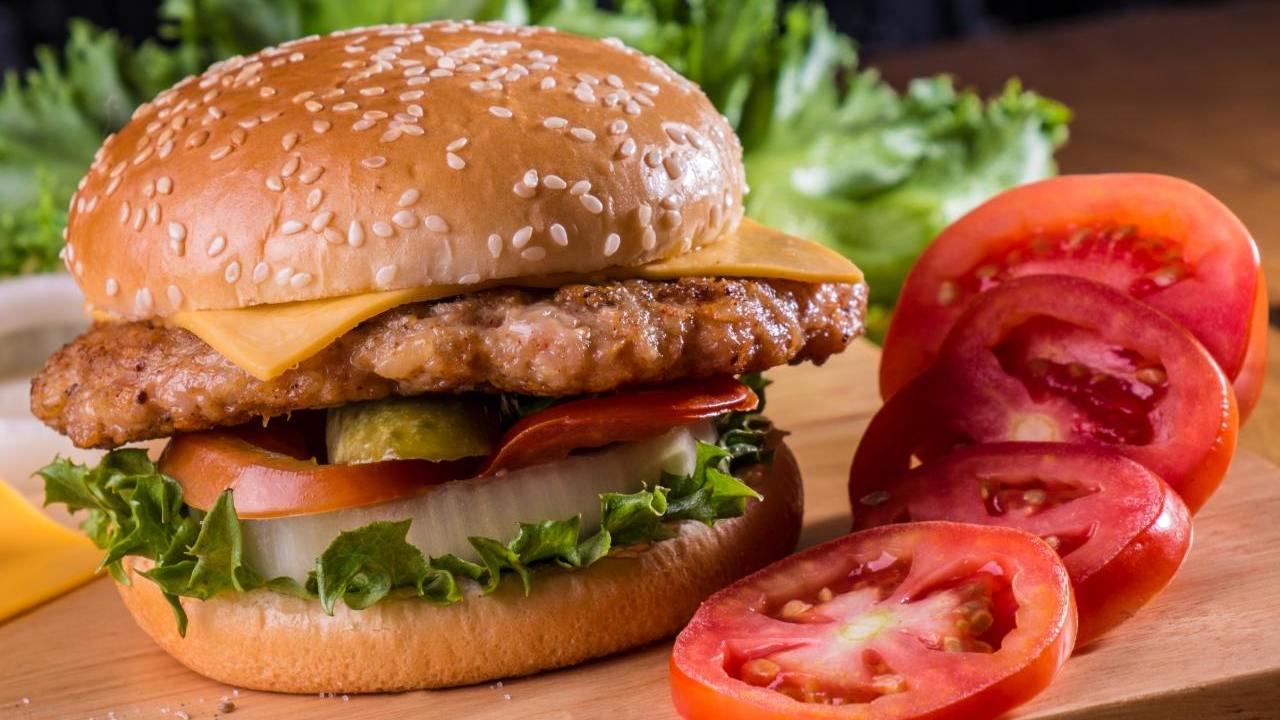 Joe's Pork Burger, avocado, house slaw, baby gem, beef tomato, focaccia bread