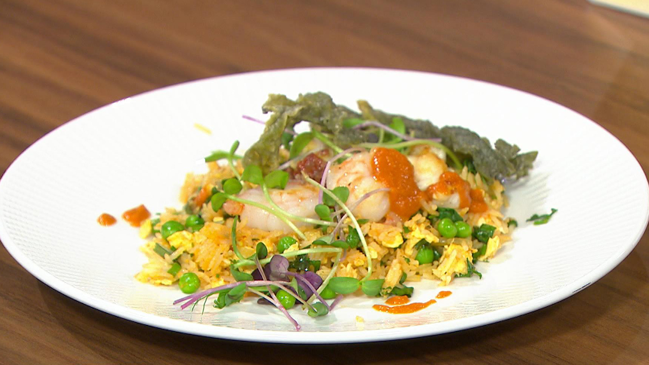 Sauté Monkfish and Tiger Prawns with hot sauce egg fried rice, chorizo and spring onion