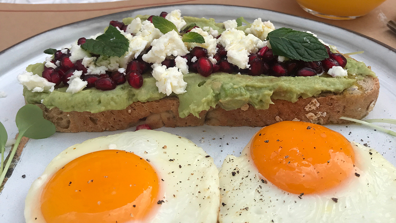 Toasted Sourdough with Whipped Herby Feta topped with Pesto Eggs