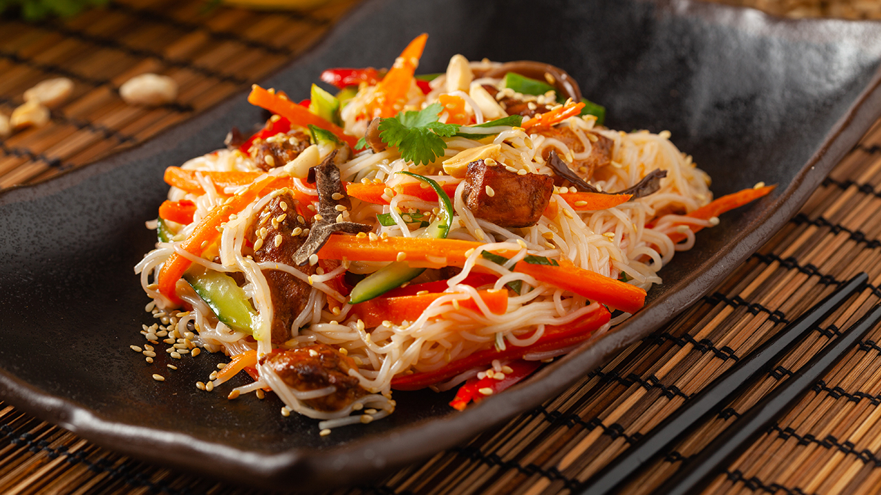 Lemon Chicken on a bed of Rice Crispy Noodles