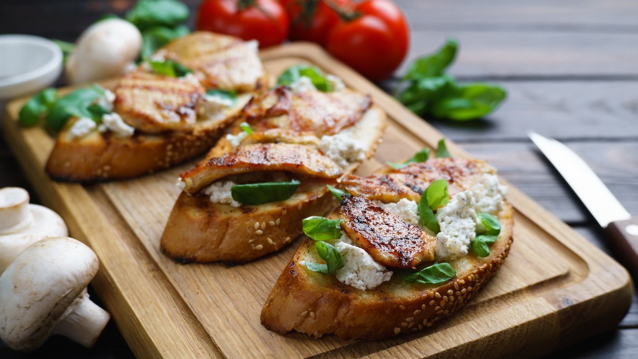 Tomato, Mozzarella, Basil and Shredded Chicken Bruschetta with Toasted Pine Nuts
