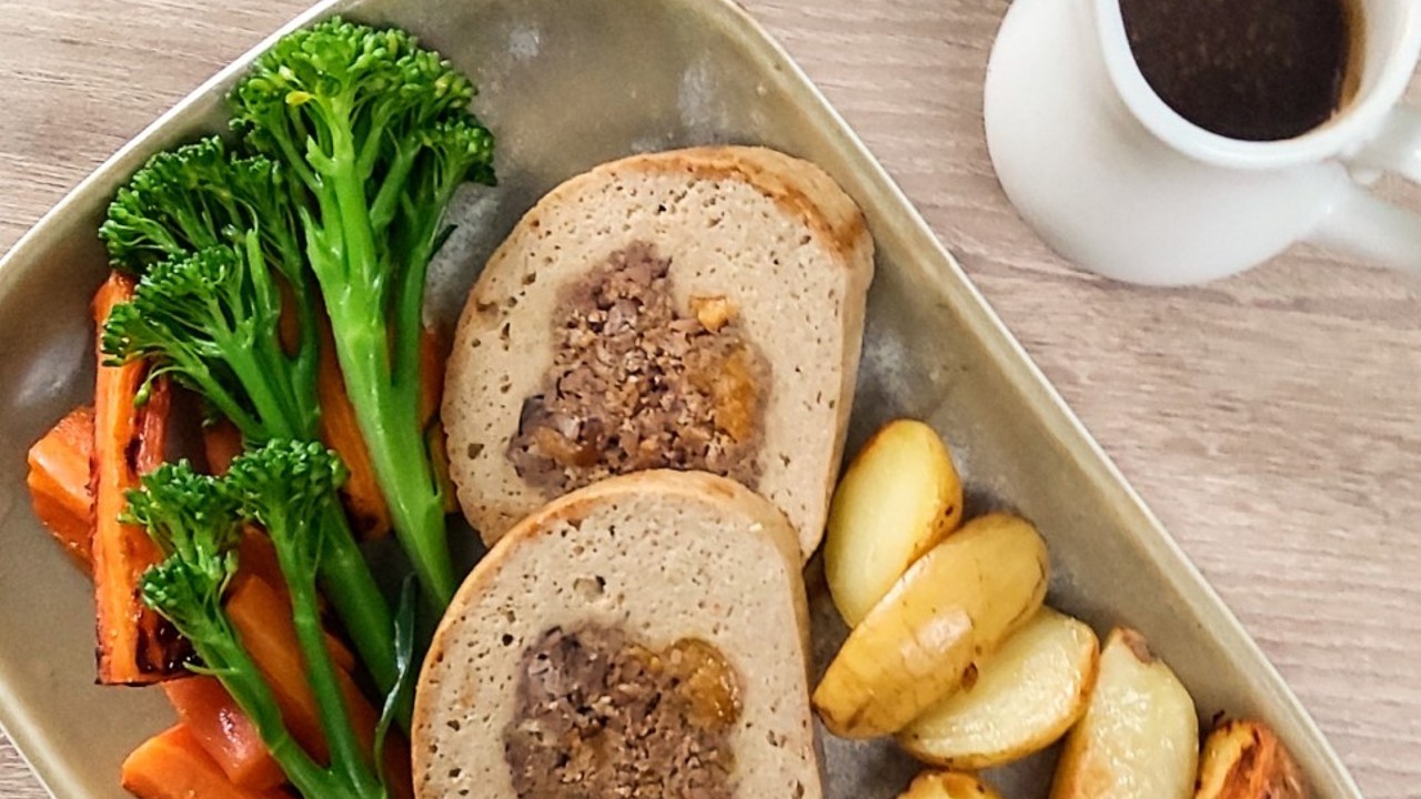 Seitan Roulade with Apricot Hazelnut Stuffing and Confit Onion Gravy