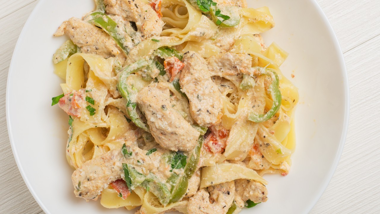 Stuffed Cheesy Cajun Chicken Pasta with roasted tomatoes & crispy pancetta