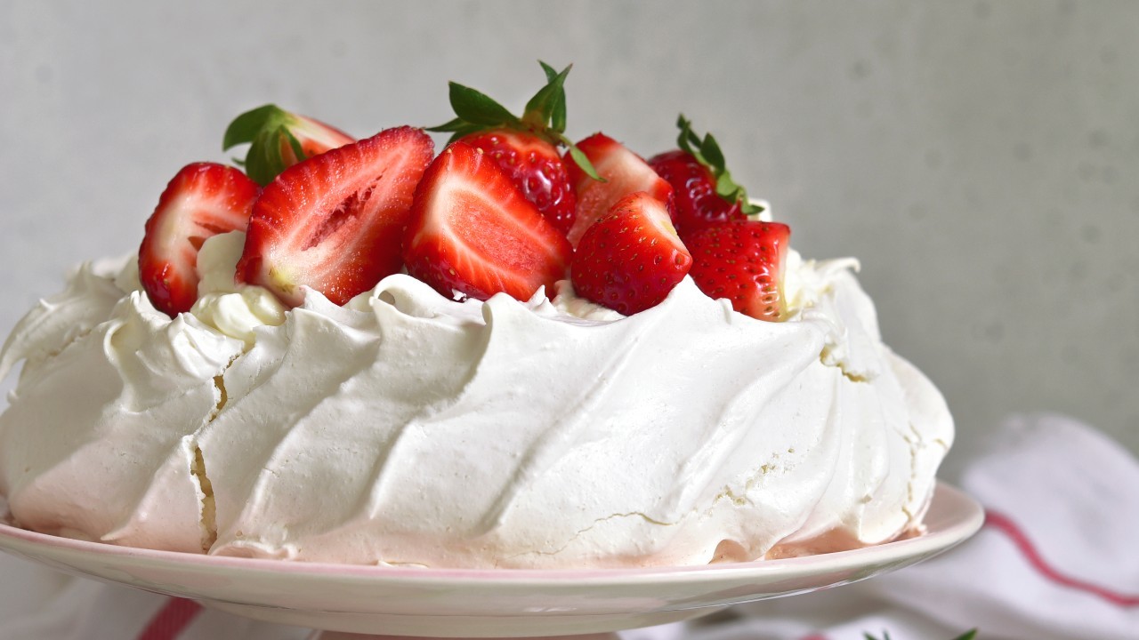 Pavlova With Strawberries, Toasted Hazelnuts and Lemon Curd