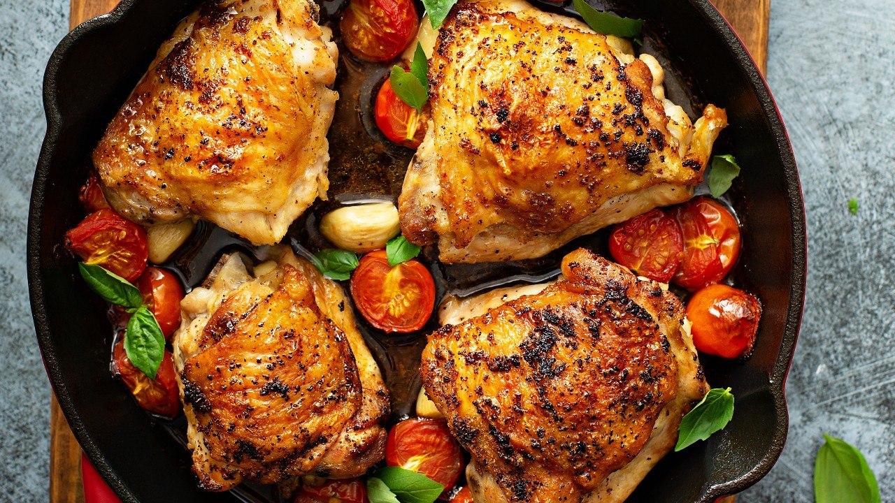 Grilled Chicken Thighs With Burnt Salsa & Lime Crema