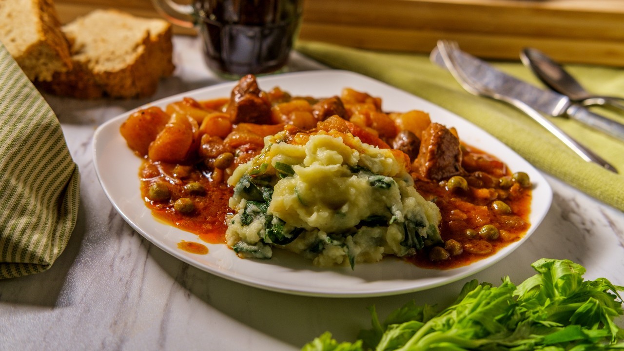 Slow-Cooked Beef Stew on Creamy Mashed Potatoes