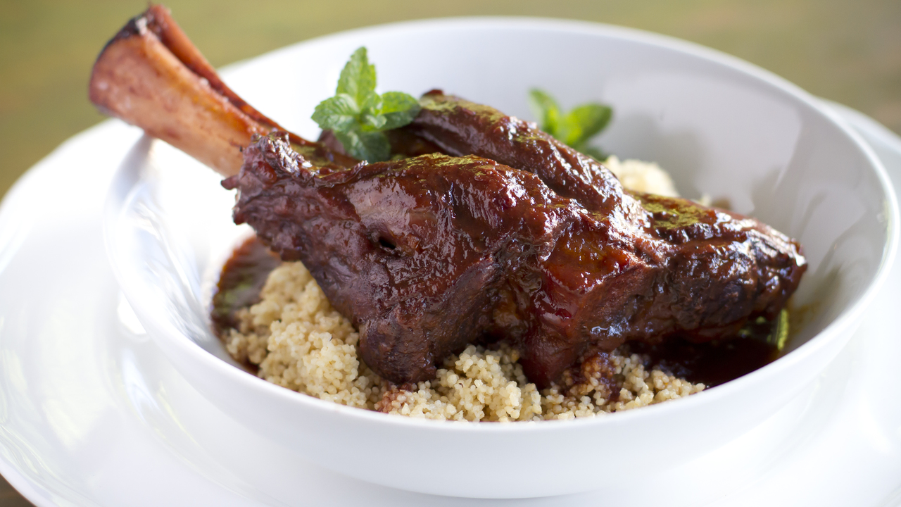 Moroccan Inspired Lamb Shanks with Sumac Onions, Golden Cous Cous & Pomegranate