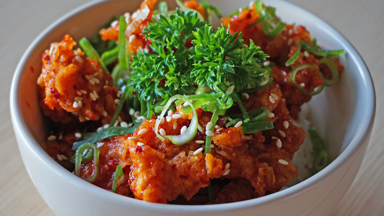 Korean Chicken Bowl with Mango, Chorizo Fried Rice and Cashew Nuts