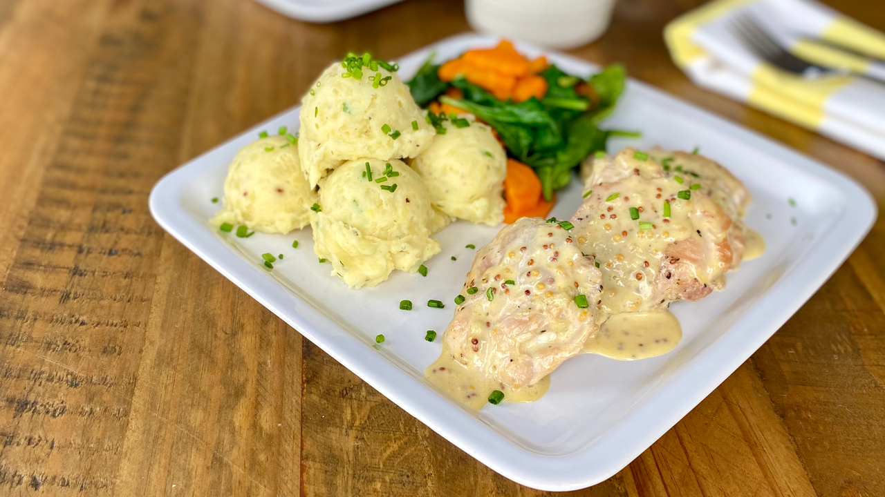 Garlic Parmesan Chicken with creamy mashed potato and citrus Tenderstem