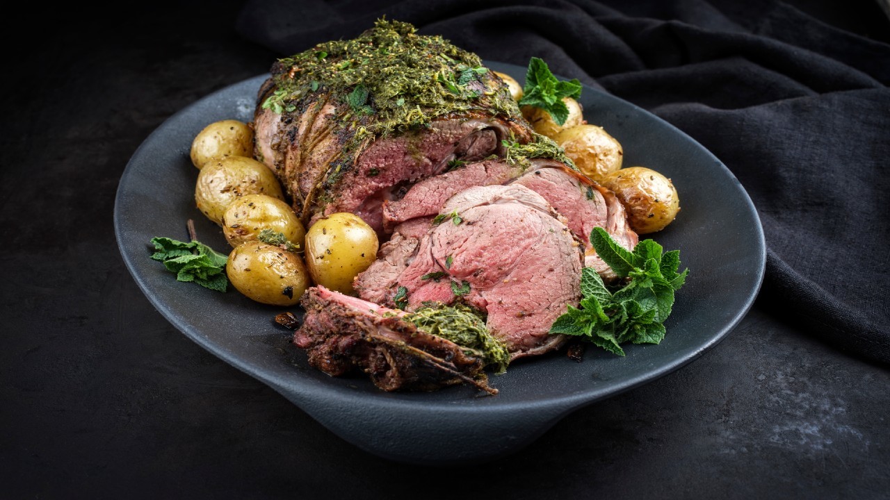 Slow Roast Lamb Shoulder, Chestnuts, Courgette and Kale Hash Potato, Minty Chimichurri Dressing.