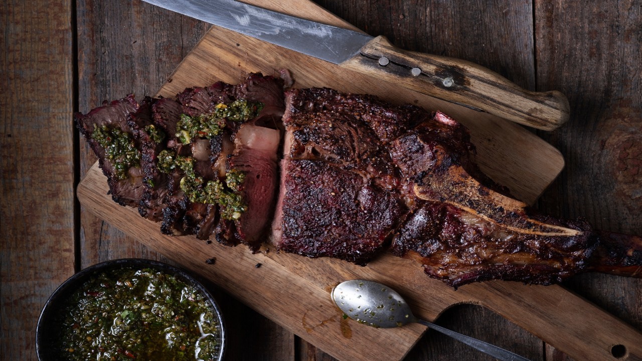 Tomahawk Steak with Onion Rings & Chimichurri