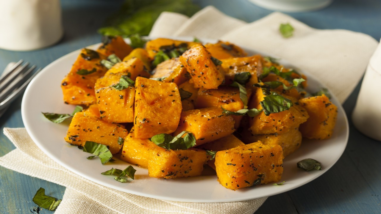 Roasted butternut Squash, walnut, caramelised red onion tart, and walnut pesto dressing