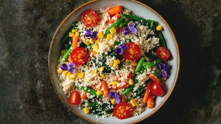 Couscous Salad with Harissa Glazed Halloumi, Cherries & Edible Flowers