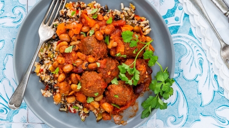 Lamb, Mint & Feta Cheese Meatballs with a Tomato & Roasted Red Pepper Sauce served with Herby Lemon Couscous.