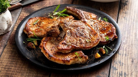 Pork chops cooked in Apple Cider and Mustard