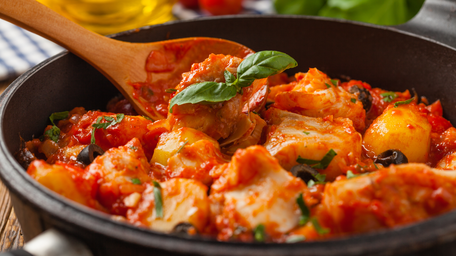 Cod with Chorizo, Butter Beans, and Tomato & Olive Sauce