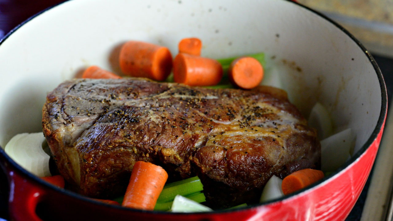 Slow-braised pork shoulder with cider & parsnips