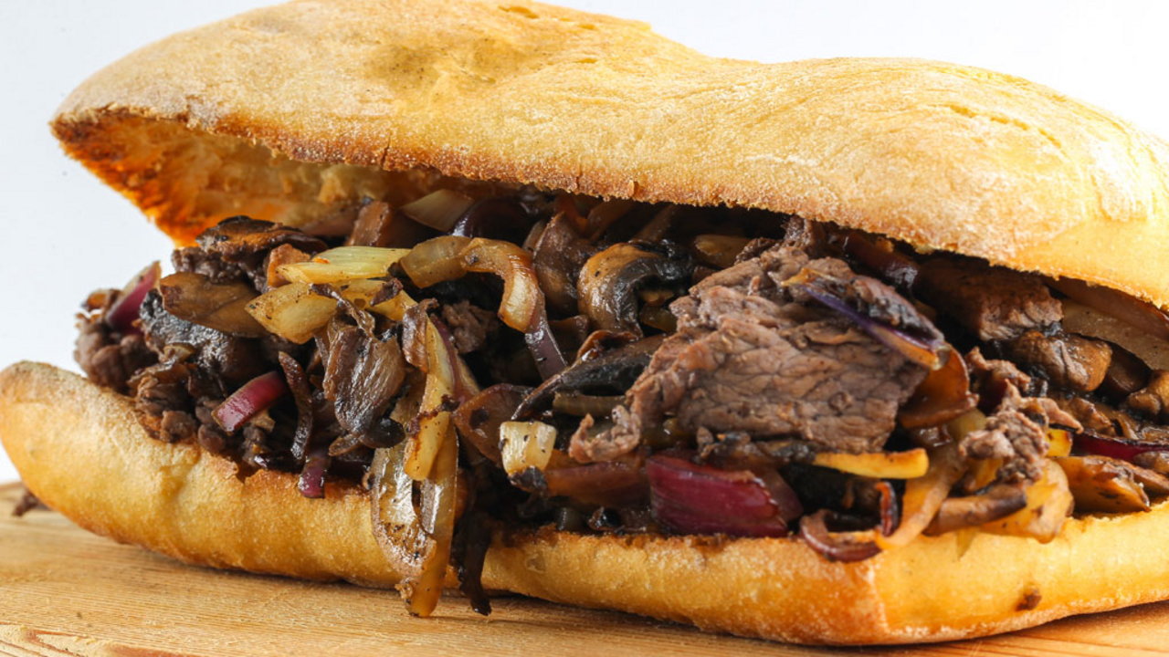 BBQ Steak with red onion and chilli jam on charred ciabatta bread