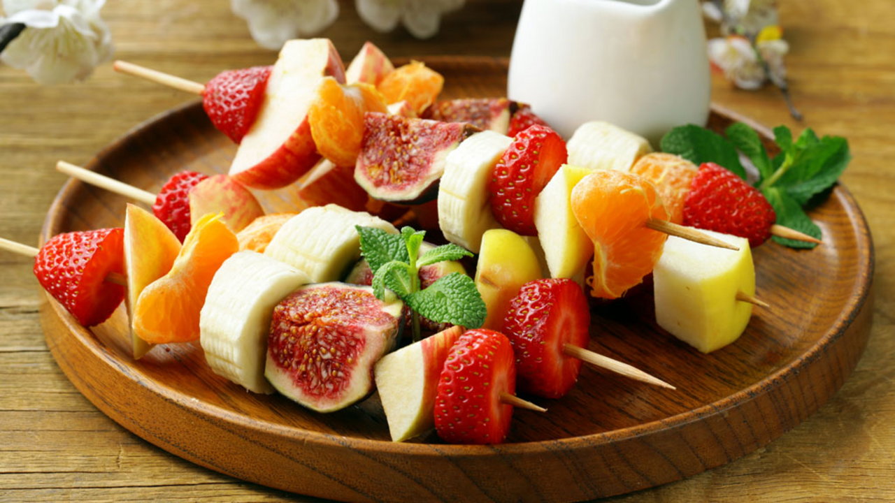 Summer fruit kebabs with rum butter glaze