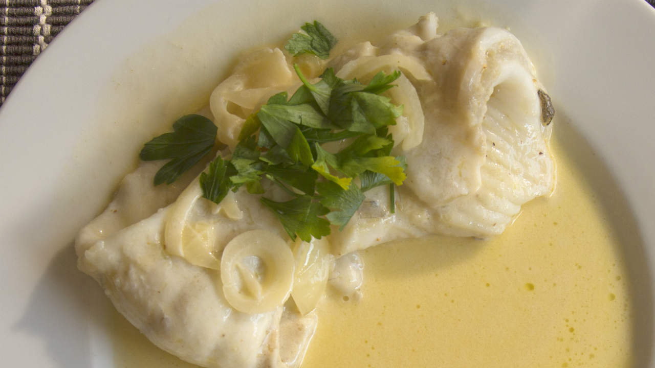 Steamed fillet of Turbot with ginger and spring onion, egg noodle and coriander broth