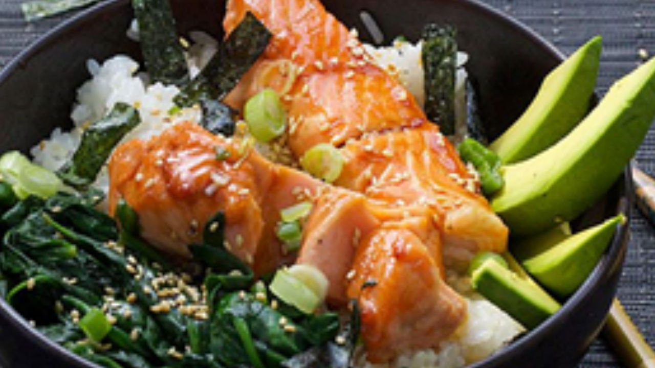 Salmon teriyaki rice bowls with greens, avocado and nori seaweed