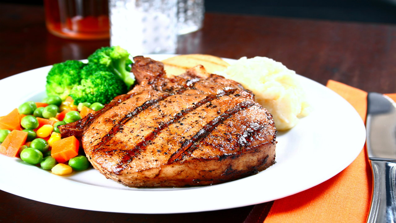 Pork Chop, Colcannon Mash, Roasted Apple & Mustard Sauce